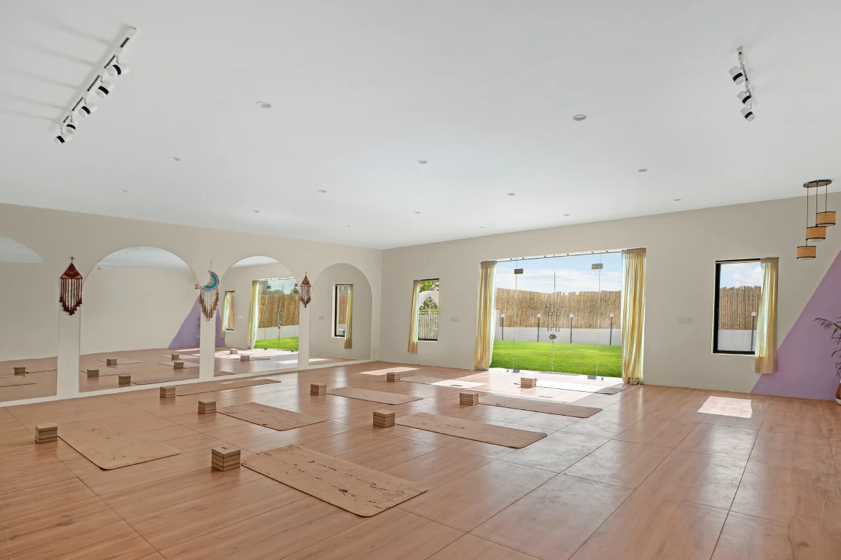 Warm wooden flooring inside the yoga hall