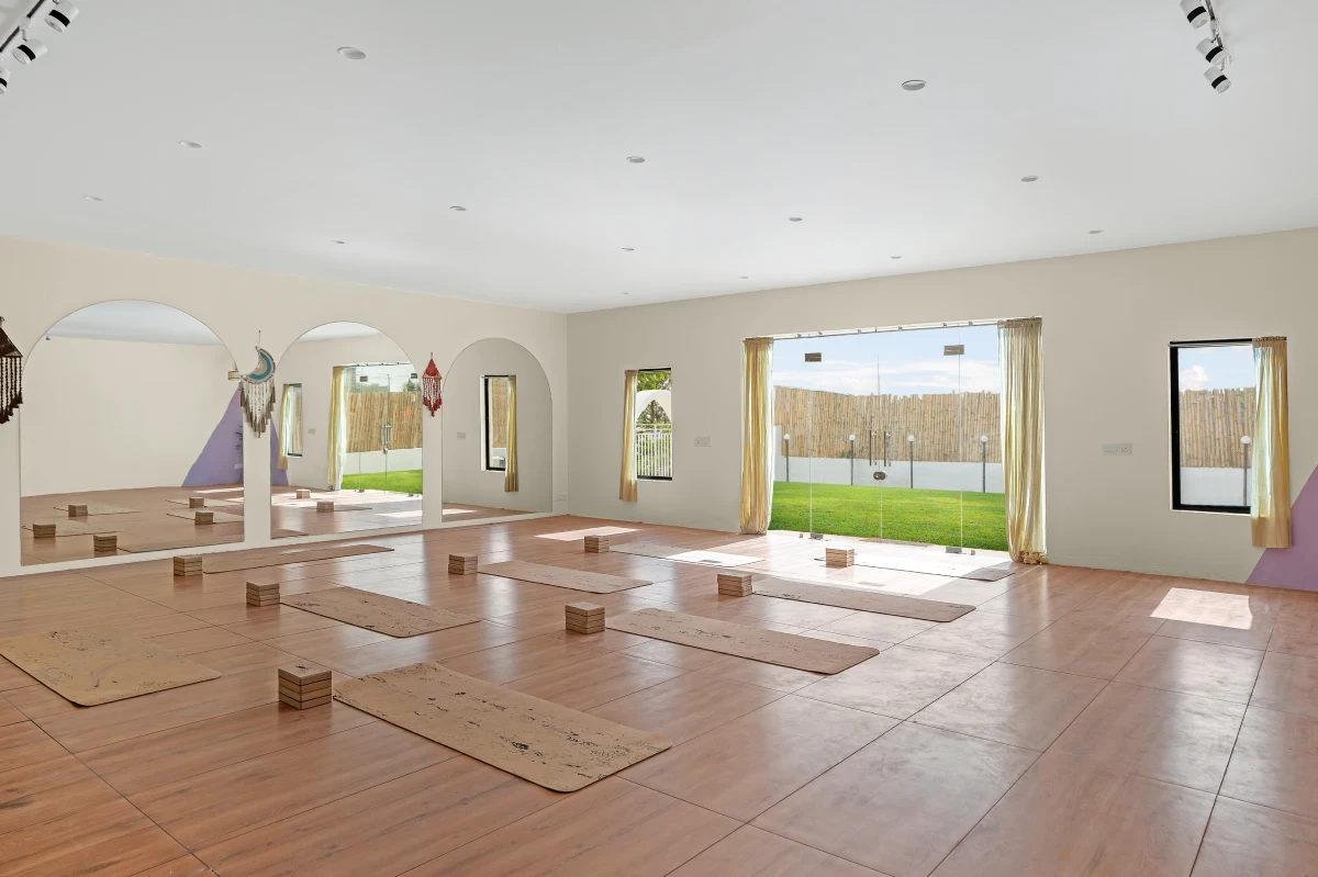 Window bay letting natural light into the yoga hall